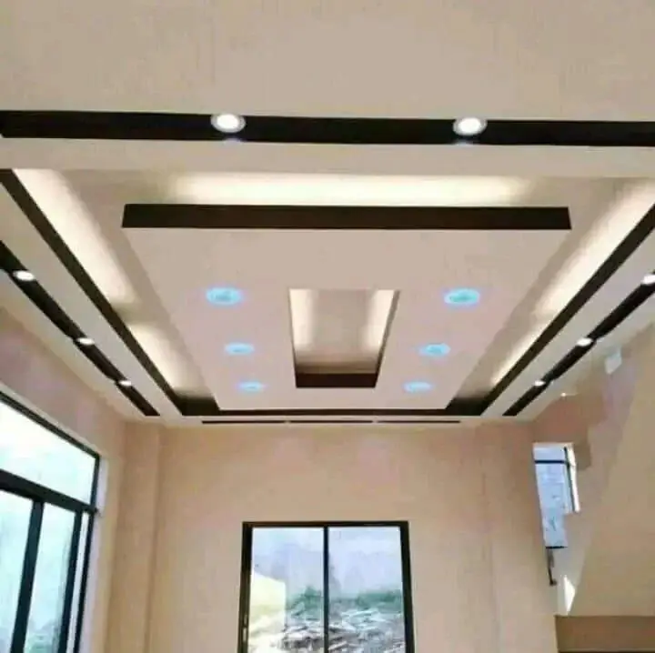 Designer recessed ceiling with feature lighting installed by Wozoli